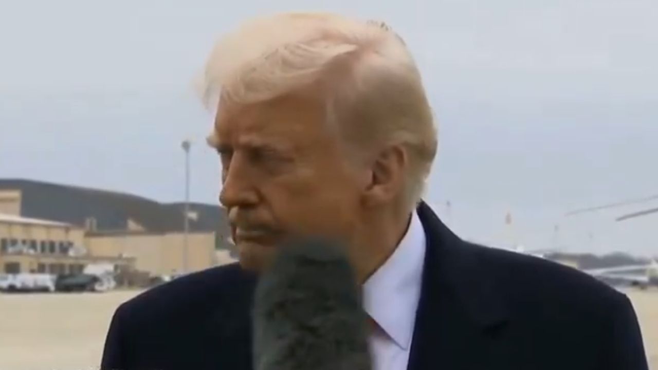 Donald Trump gets hit in the face with a microphone and responds sharply to reporter